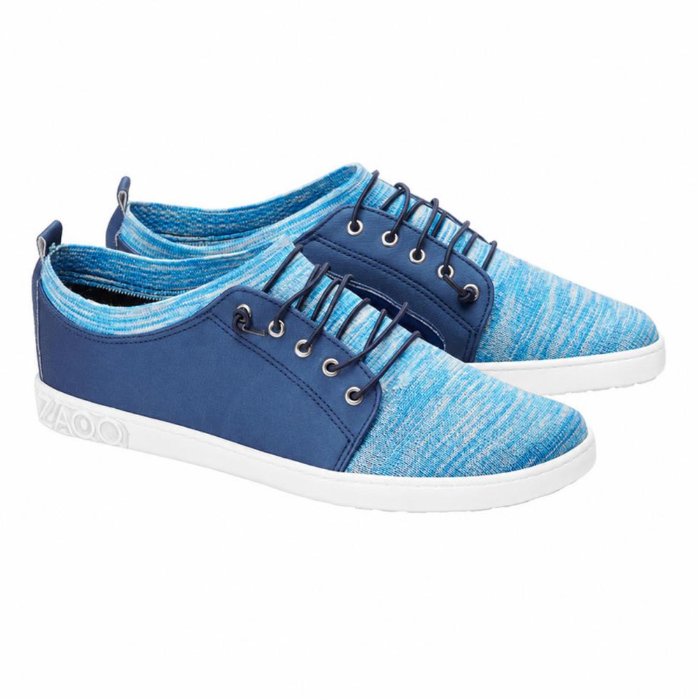 Sneakers QRIS Blue od ZAQQ wykonane są z strukturalnej tkaniny i ciemnoniebieskich wstawek, aby zapewnić całodzienną oddychalność. Te stylowe buty barefoot posiadają białe podeszwy z unikalnym wzorem oraz ciemnoniebieskie sznurówki przewleczone przez metalowe oczka, co czyni je idealnymi na każdą swobodną okazję.